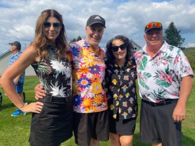Alison, Rob, Sandy, and Dwayne gather for a team photo.