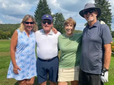 Liz, Carl, Charlotte, and Glenn gather for a team photo.