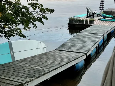 The ramp and dock sections at sunset, seen from the shore