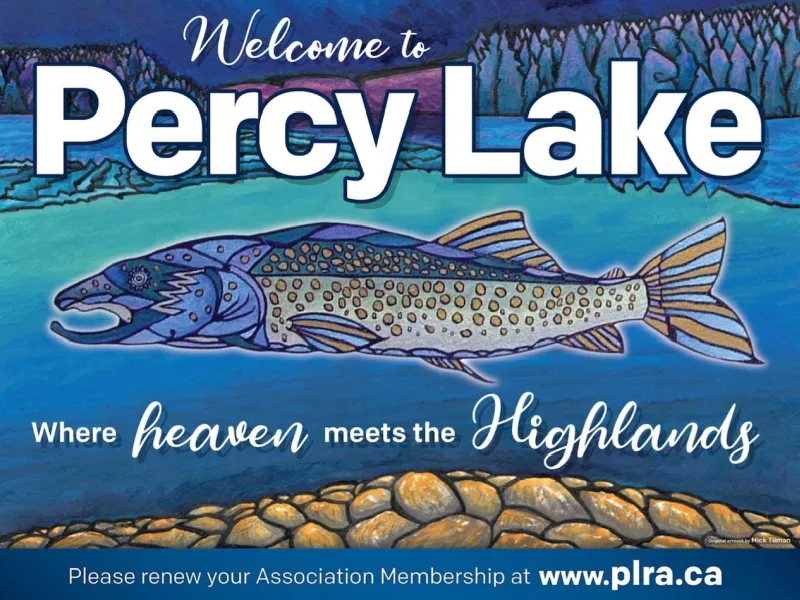 The Percy Lake sign that reads, where heaven meets the highlands, please renew your association membership at www.plra.ca