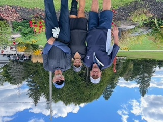Team #5 made up of three golfers pose at the Lakeside Golf Course.