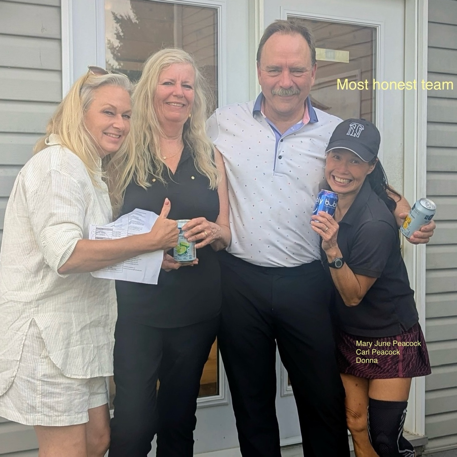 A team of three golfers accepts the most honest team award.
