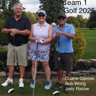 Three golfers that make up team 1 pose with clubs in hand.